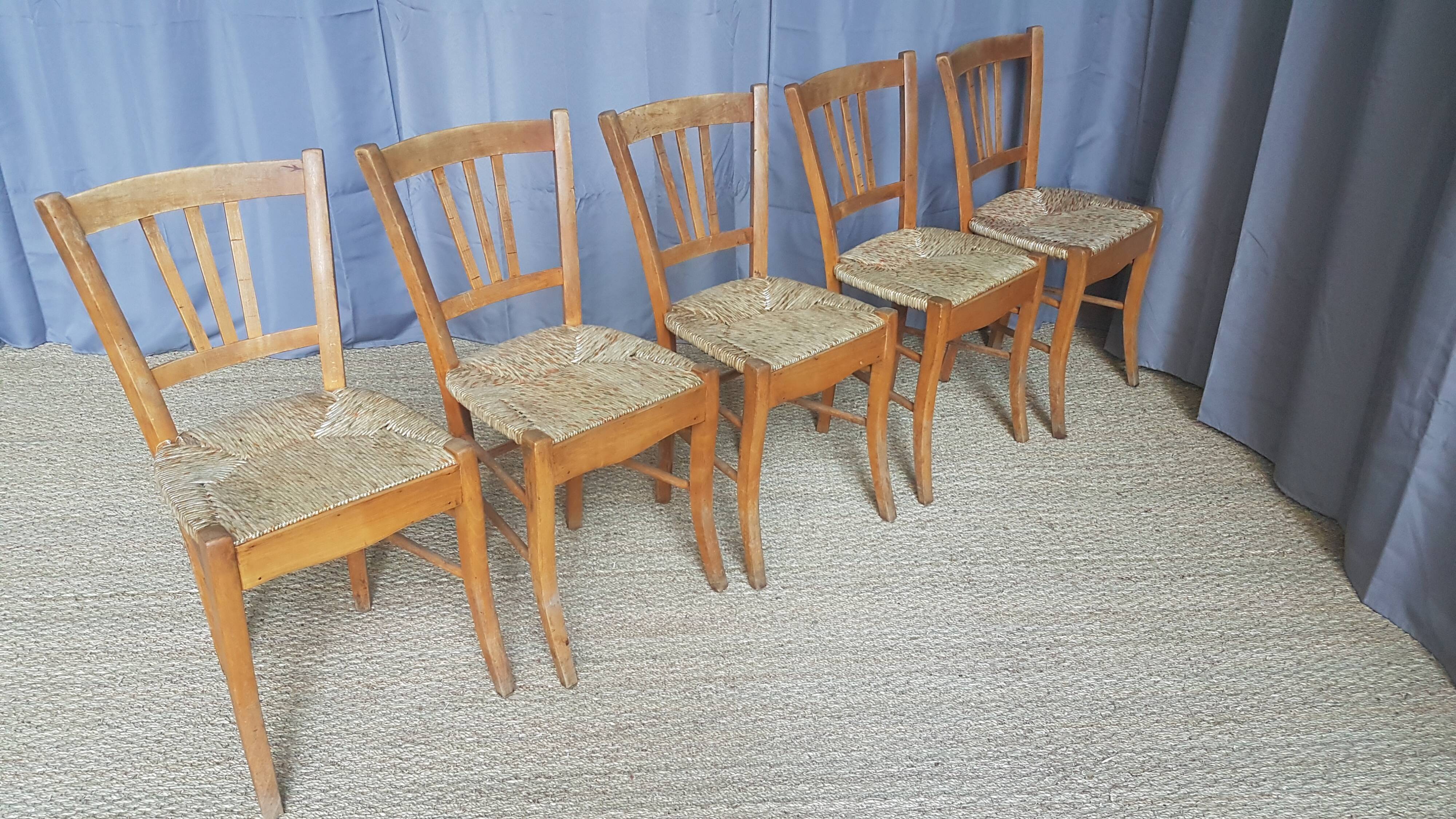 Series of 5 old mulched chairs