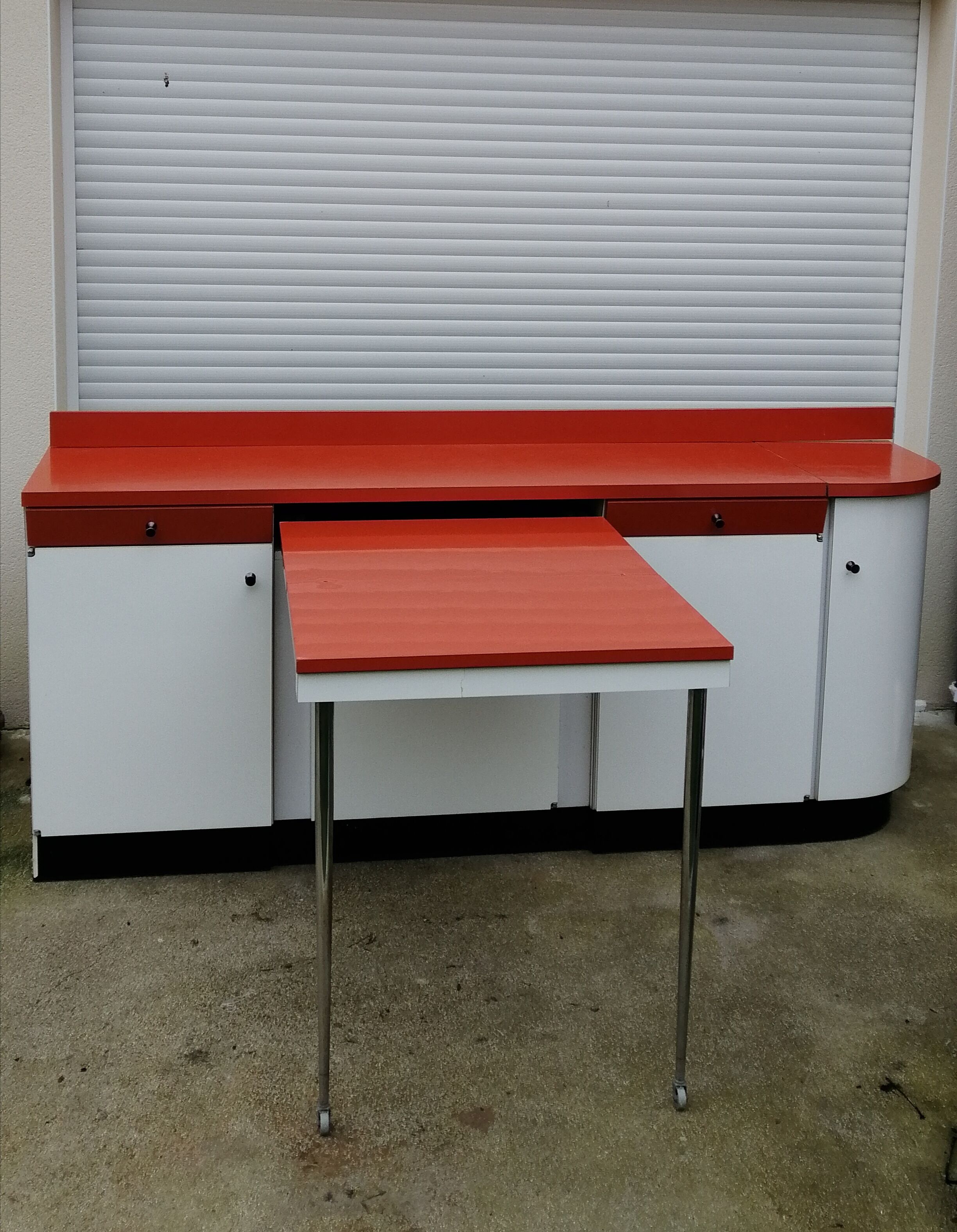 Formica sideboard with its 70' retractable table