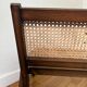 Vintage wooden and cane armchair