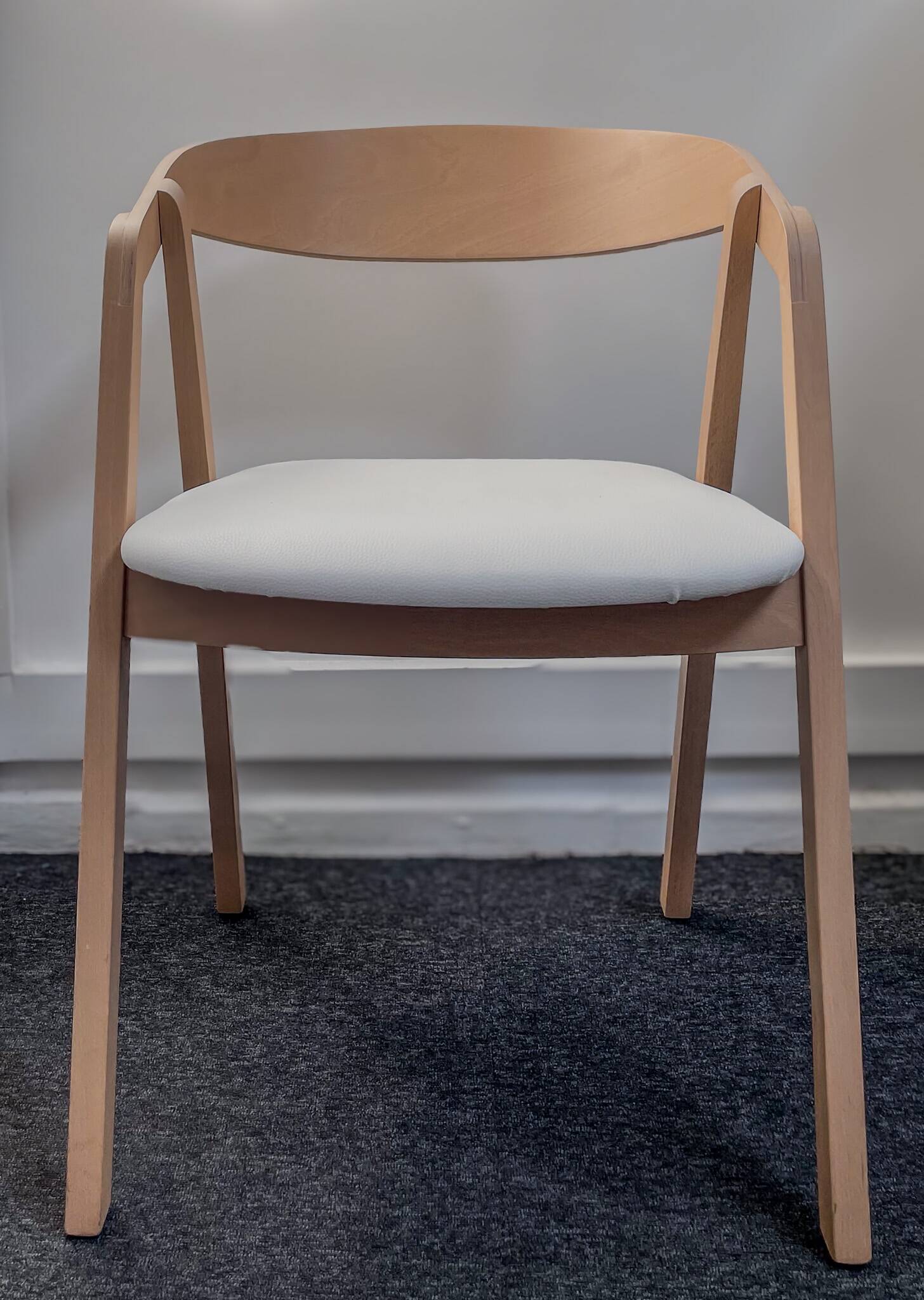 Professional chairs in beech and coated white textile