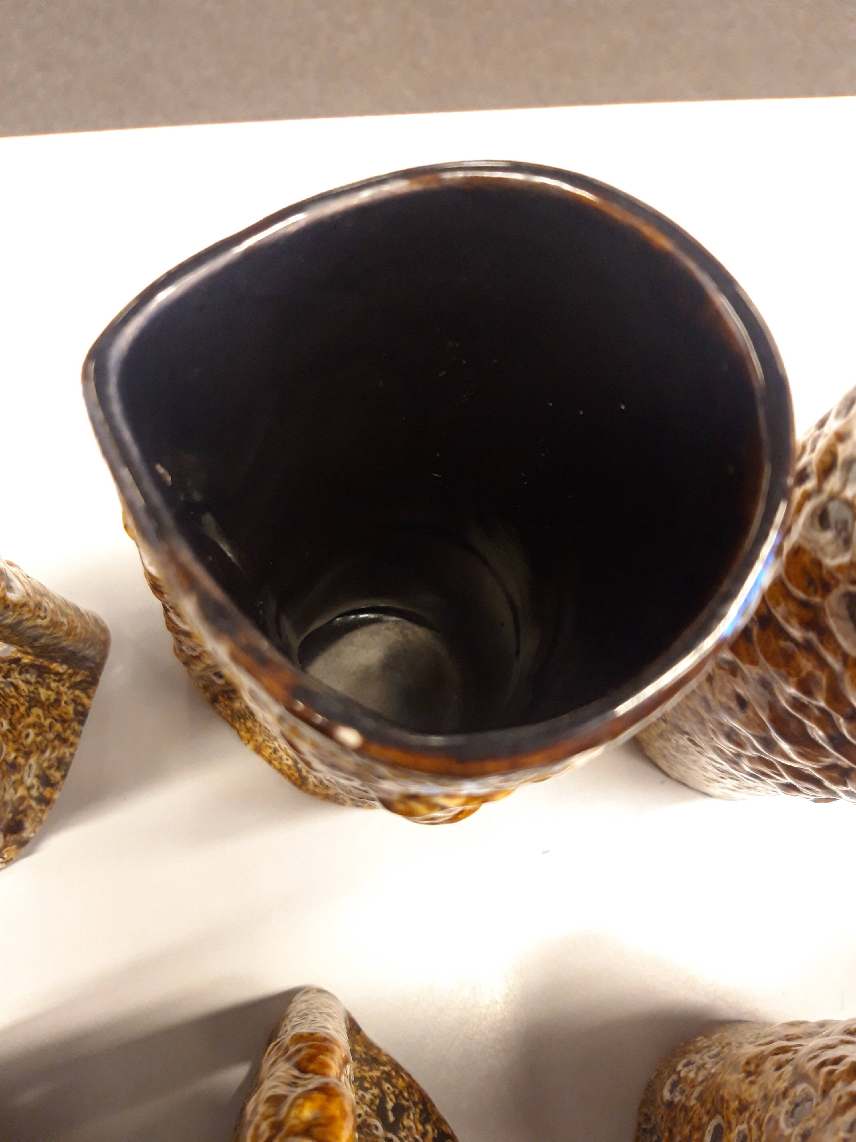 Set of 8 glazed ceramic mugs