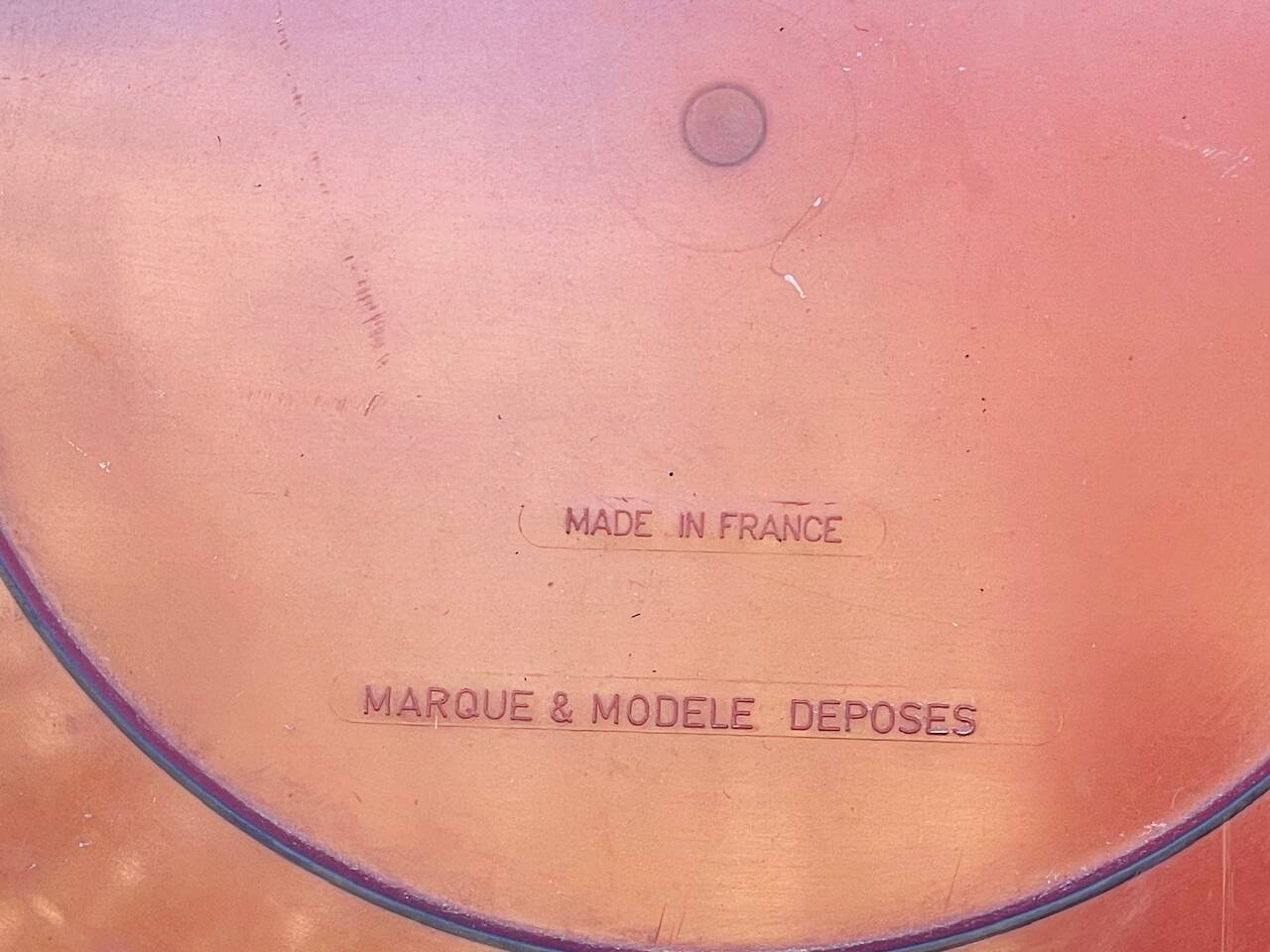 Vintage round smoked plastic mirror, circa 1970s.