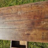 Wooden table with a drawer