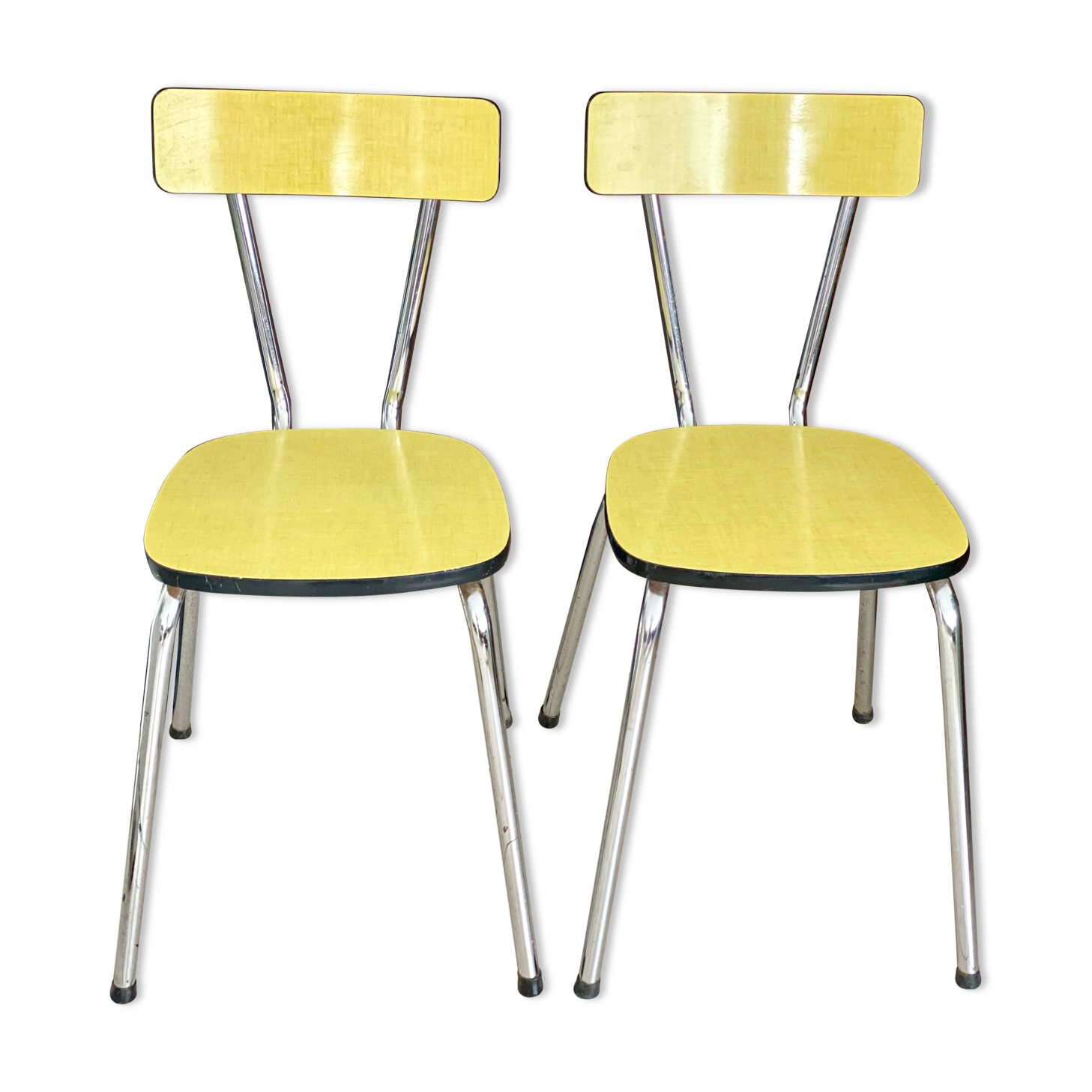 Pair of yellow formica chairs