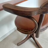 Thonet armchair, swivel, in wood and faux leather.