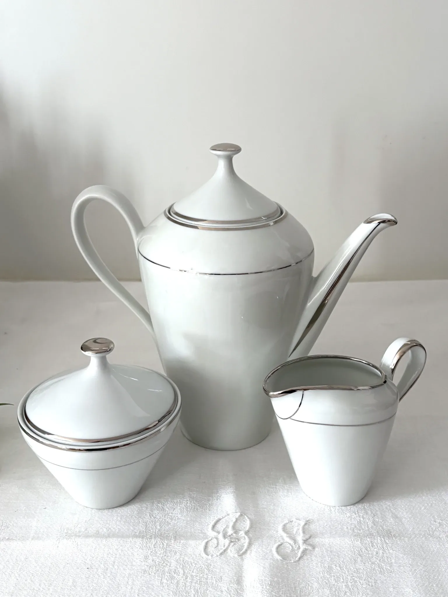 Coffee pot, milk jug and sugar bowl white porcelain