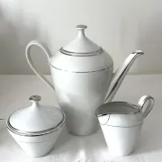 Coffee pot, milk jug and sugar bowl white porcelain