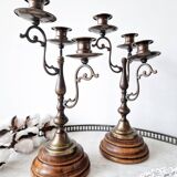 Pair of antique wooden and brass candlesticks