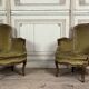 Pair of louis xv style armchairs in carved beech around 1920