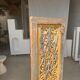 Rectangular Indonesian construction element with blue and yellow plant in carved wood