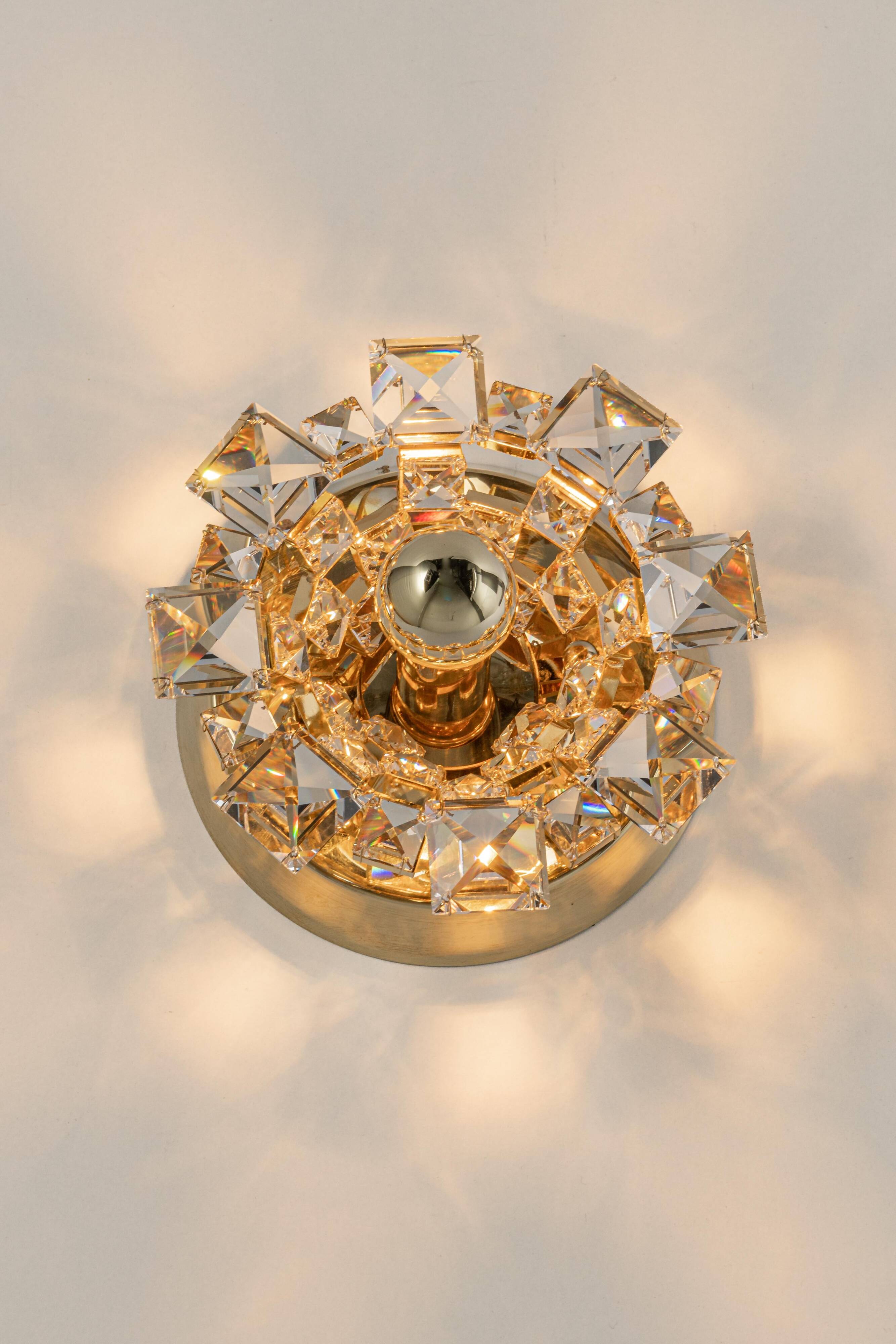 Pair of wall sconces in gilded crystal by Palwa, Germany, 1960s.