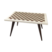 Table basse pieds compas plateau échiquier
