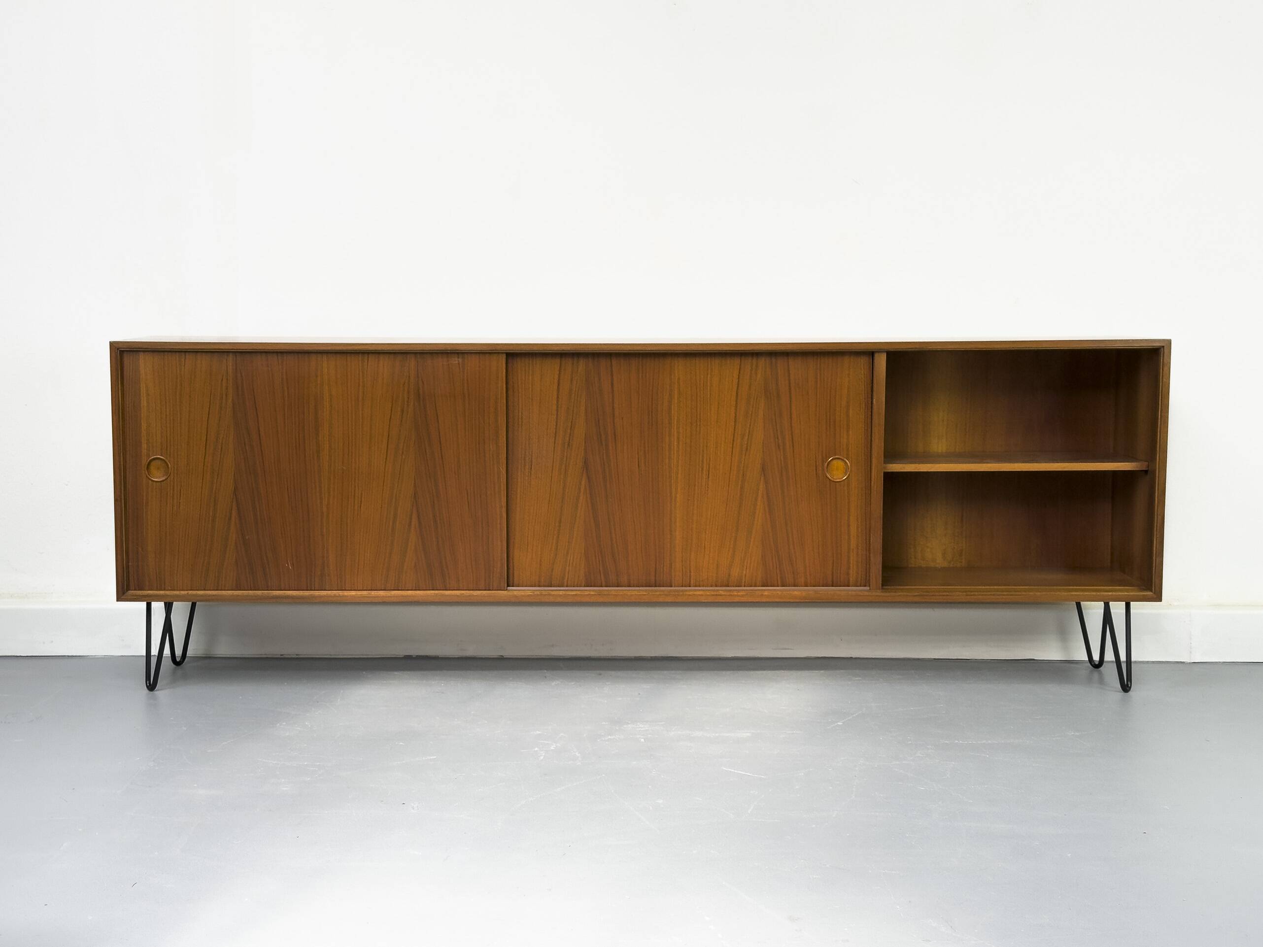 Walnut sideboard with sliding doors by Franzmeyer, 1959