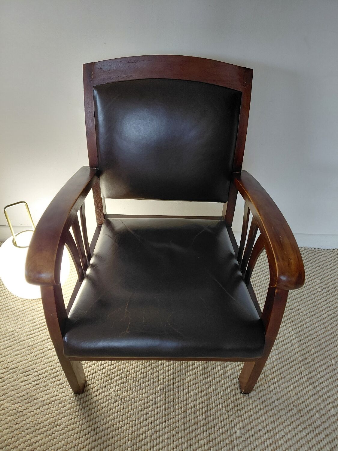 Colonial style wooden armchair