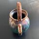 Green and ochre flamed goat