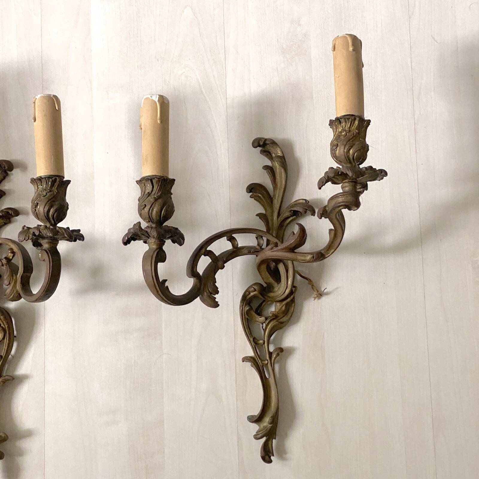 Pair of bronze wall sconces in Louis XV style