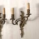 Pair of bronze wall sconces in Louis XV style