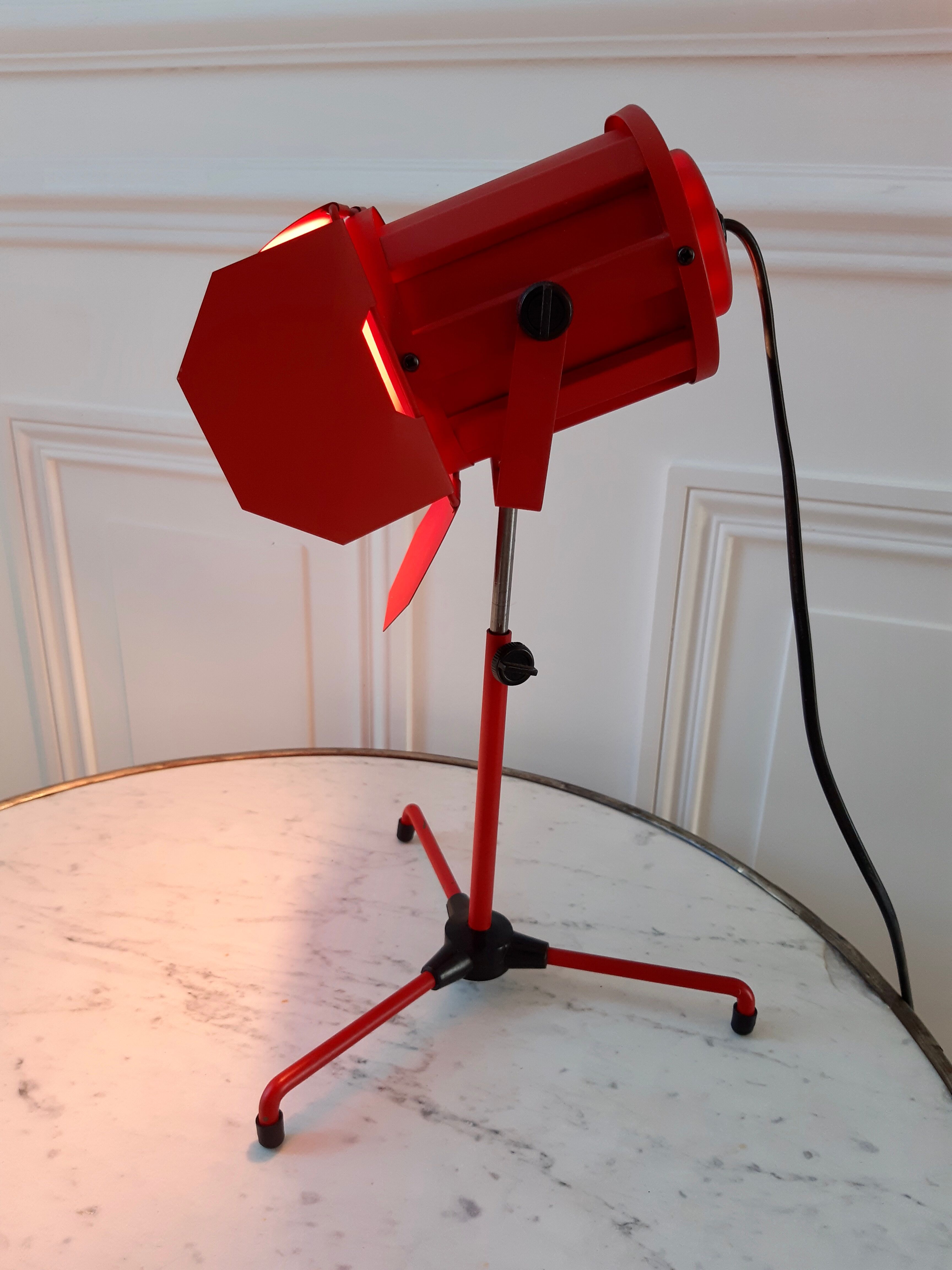 Orange-red 80s steerable cinema projector lamp