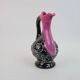 Black and pink Vallauris carafe with white relief patterns