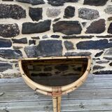 Console / coffee table in rattan and tempered glass.