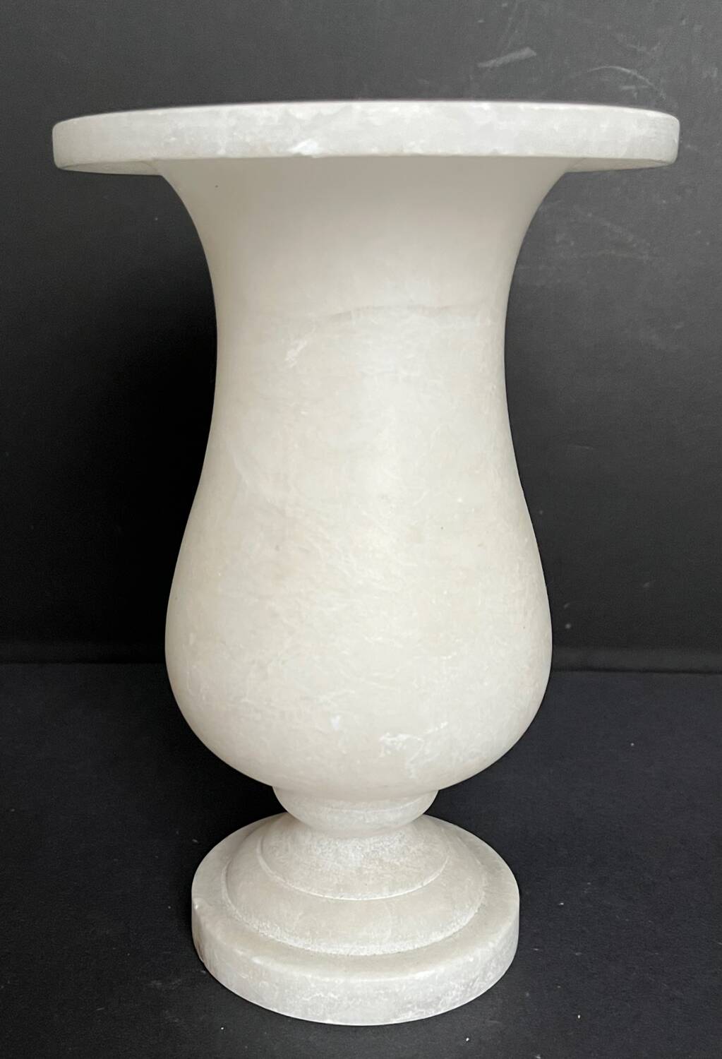 Alabaster vase on pedestal
