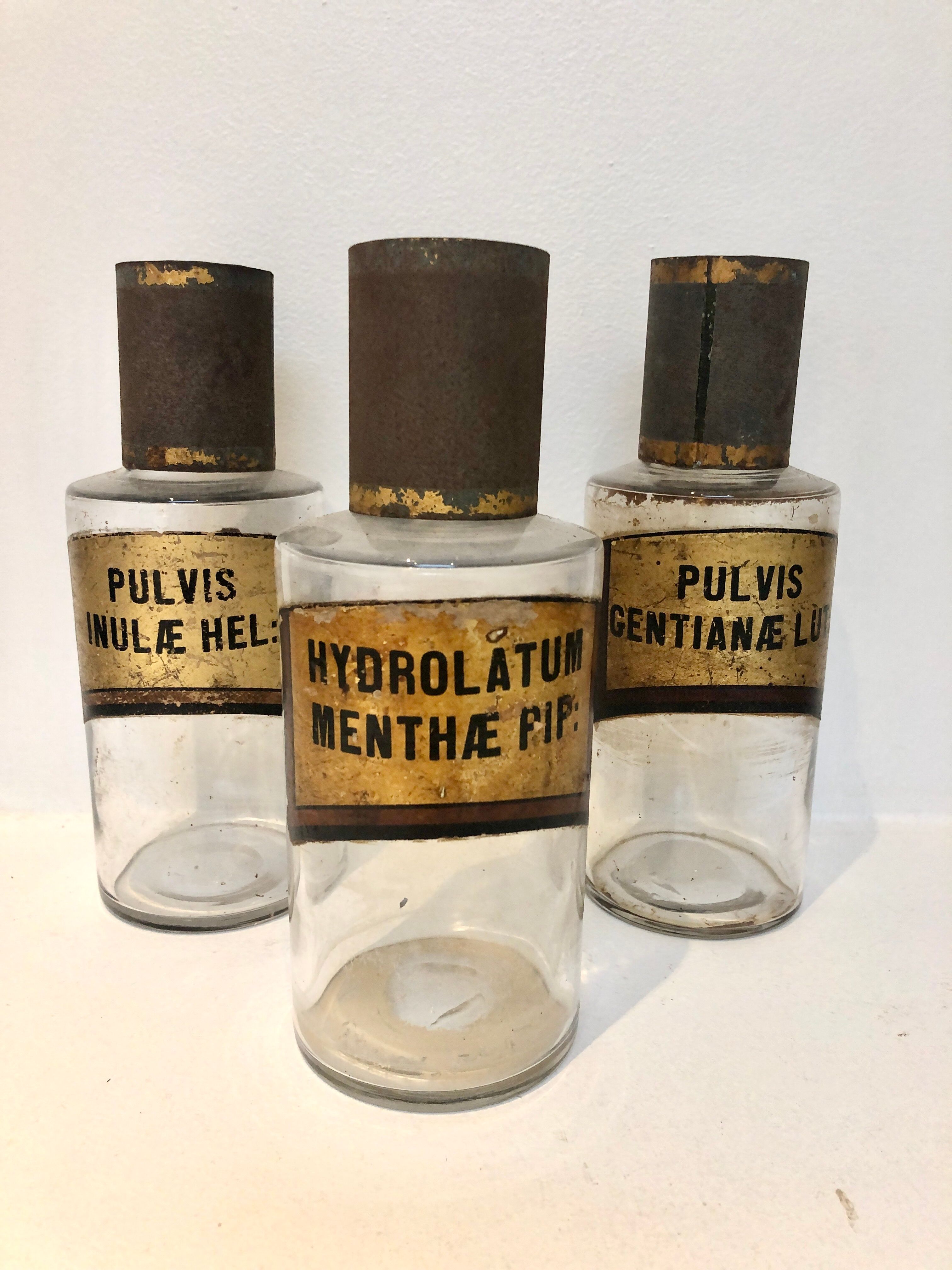 Trio apothecary bottles, early 20th