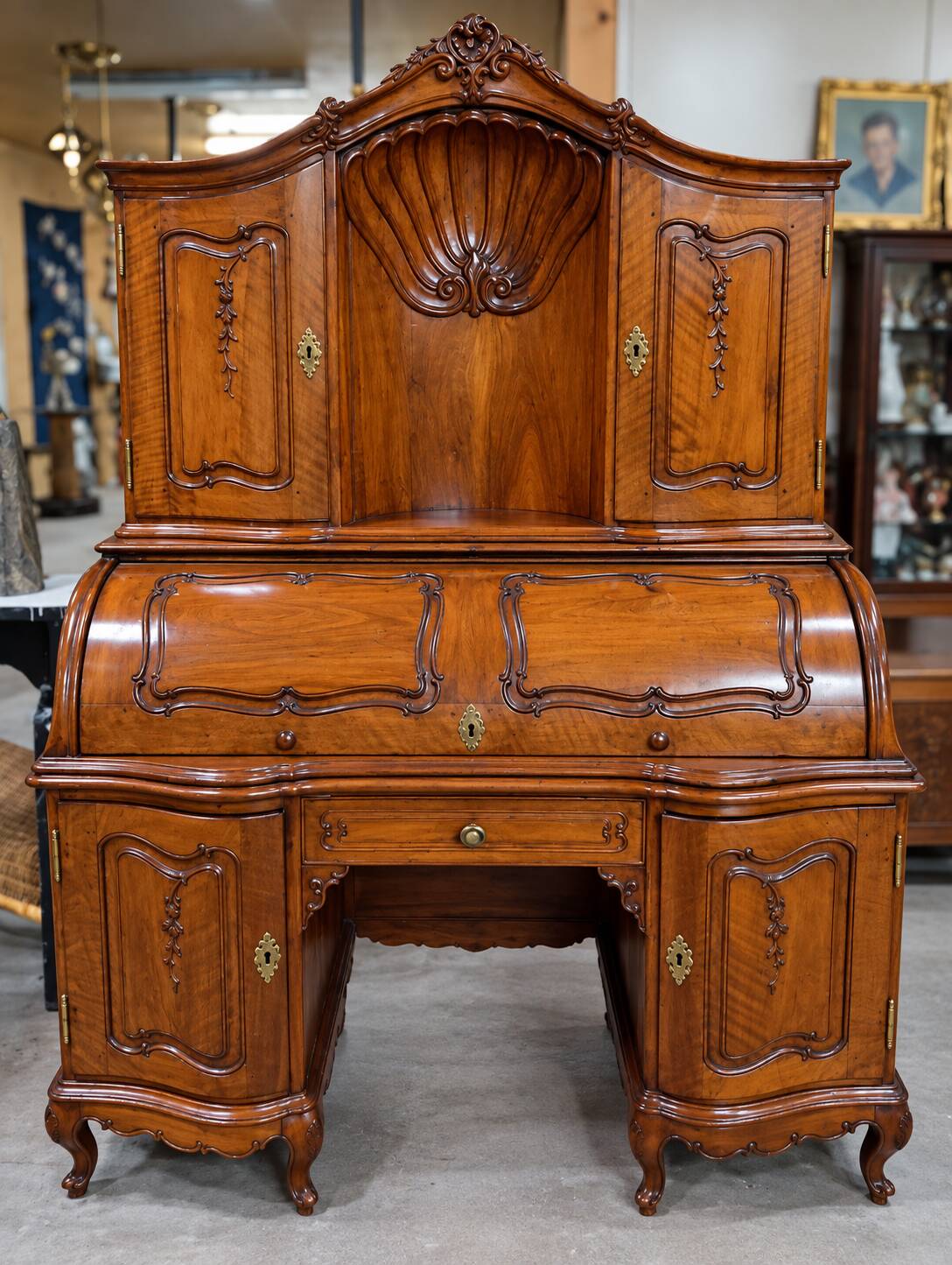 cylinder desk in carved walnut – Louis XV period – 18th century