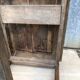 Old chestnut table with 3 front drawers and a cat bar.