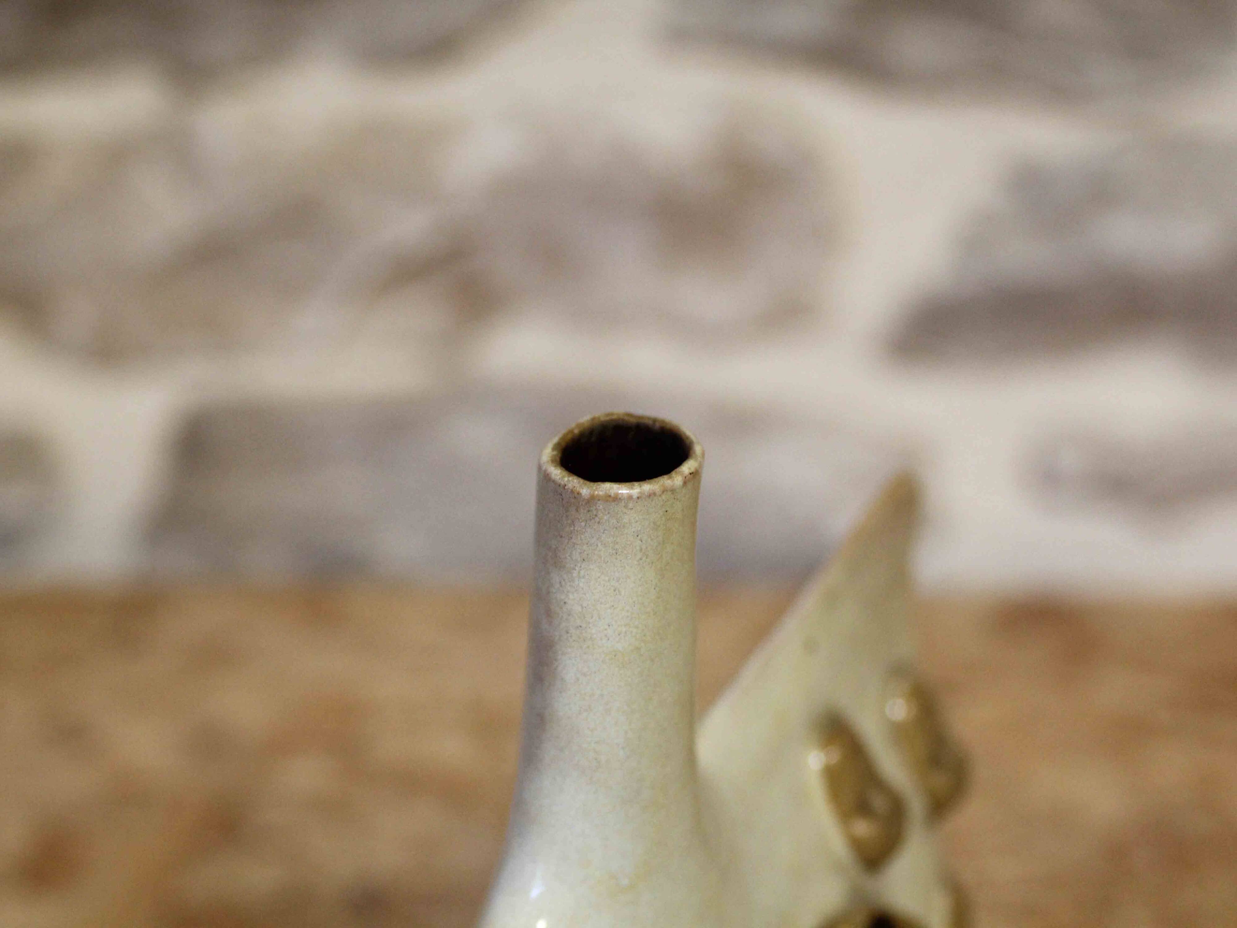 Ceramic soliflore vase with face decoration
