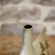 Ceramic soliflore vase with face decoration