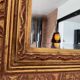Old Beveled mirror in gilded wood