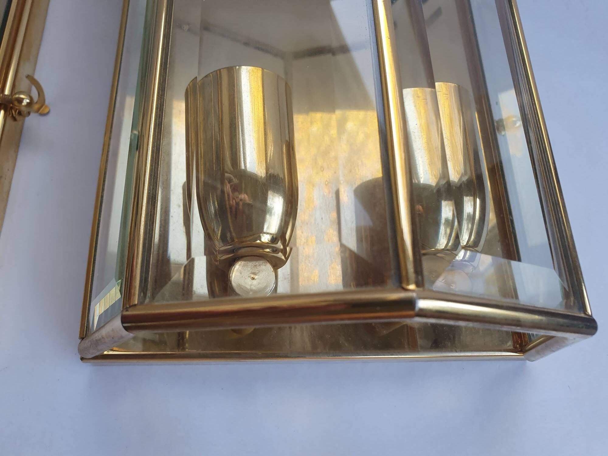 Pair of Italian gold-plated brass wall sconces with beveled glass