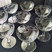 8 vintage champagne coupes with engraved decoration