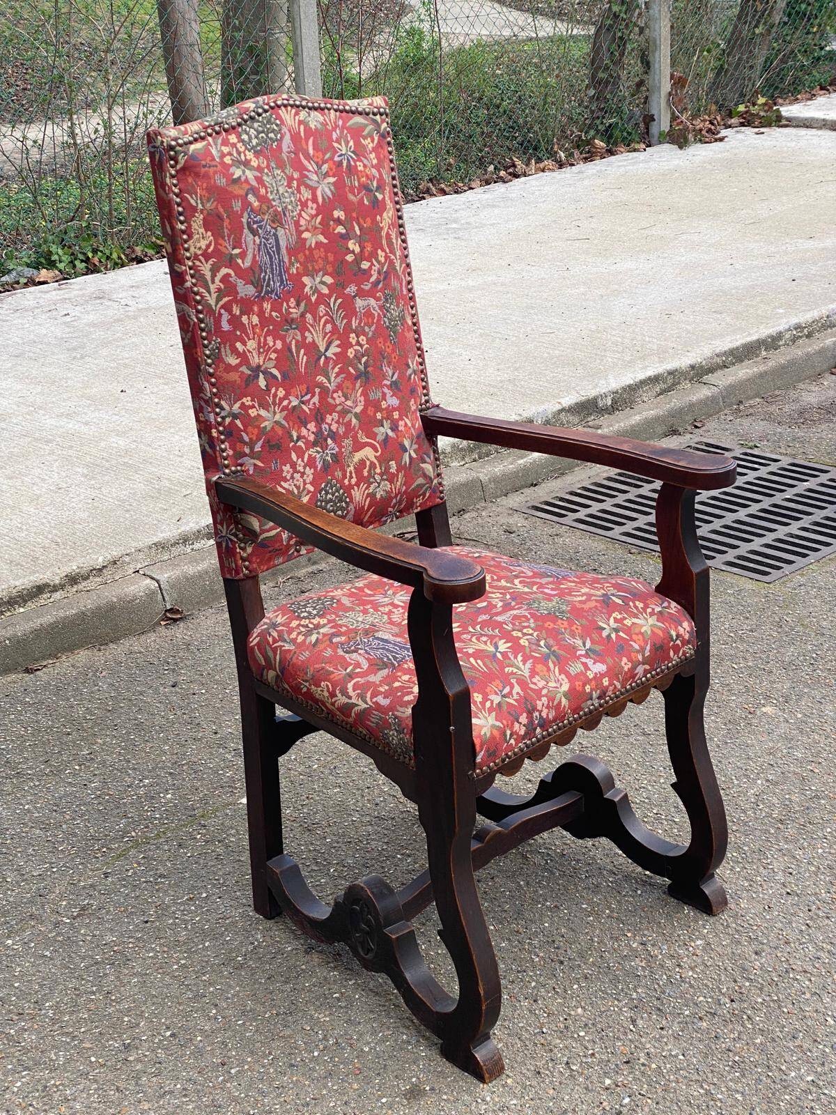Henri II armchair in solid wood and floral burgundy fabric, 19th century.