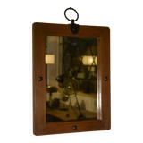 Brutalist mirror in solid oak with metal ring, 1960s.