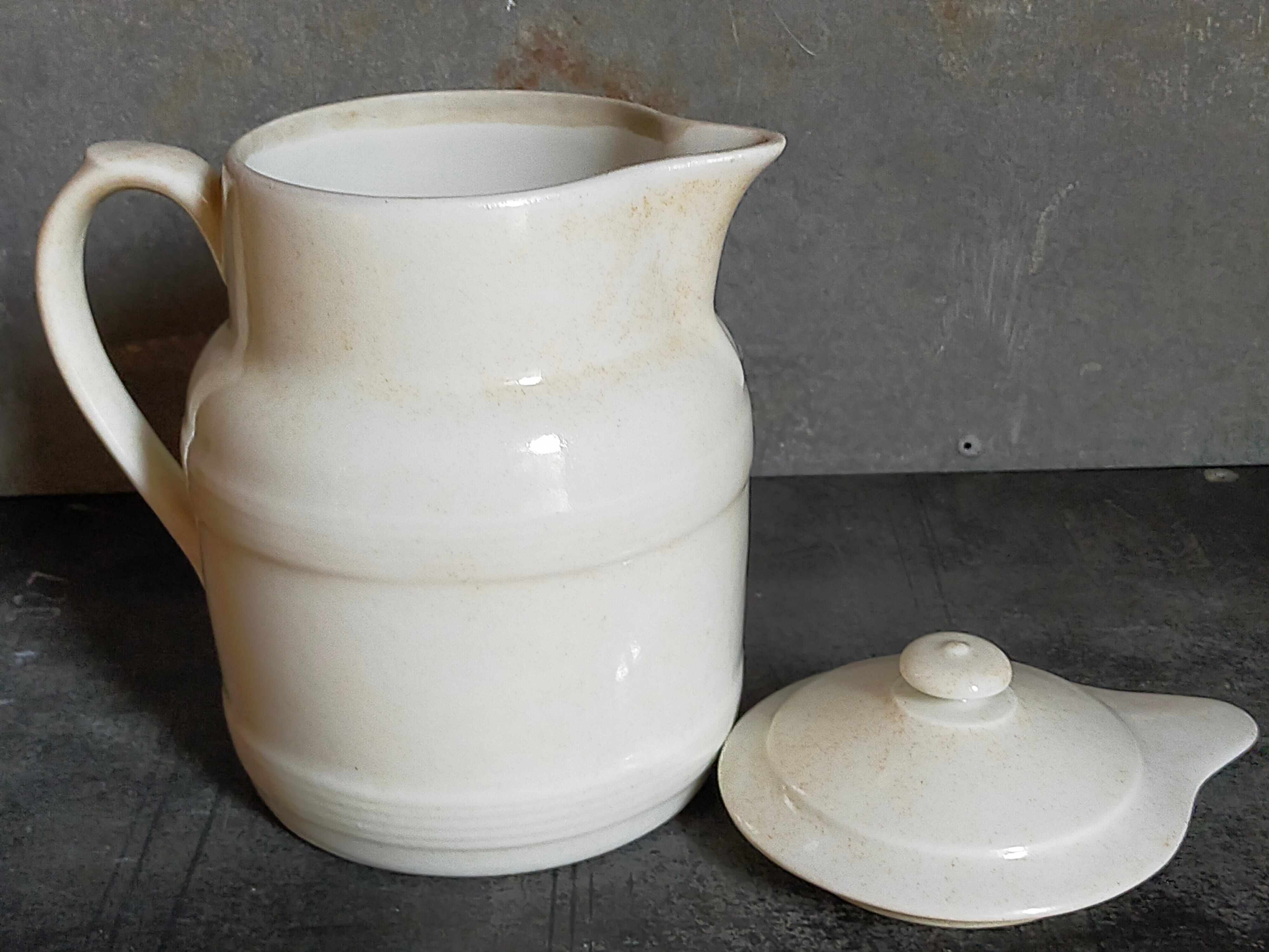Covered pitcher in porcelain fire of Grigny XIXth stamped P.Precious