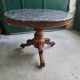 Round pedestal table with marble top and mahogany tripod from the 19th century