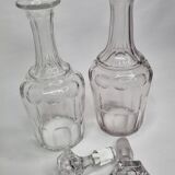 Set of two carved crystal decanters, 24 cm