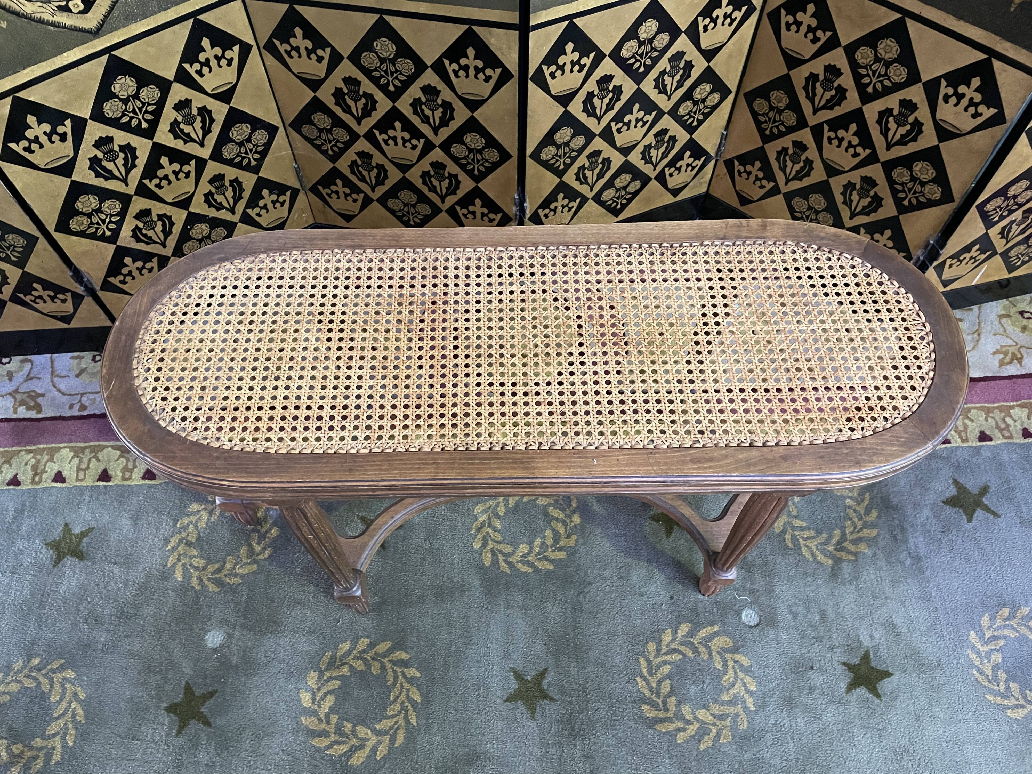 Louis XVI piano bench in cannage