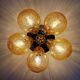 Large designer ceiling light in brass and amber crackled glass, 1970s.