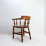 Elm armchair with curved back