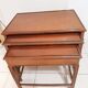 3 30s mahogany pull-out tables in their juice