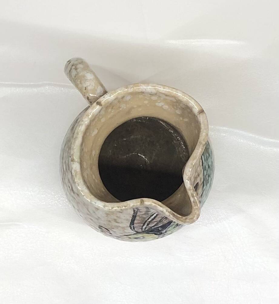 Toledo ceramic pitcher by Pablo Sanguino with fish decoration