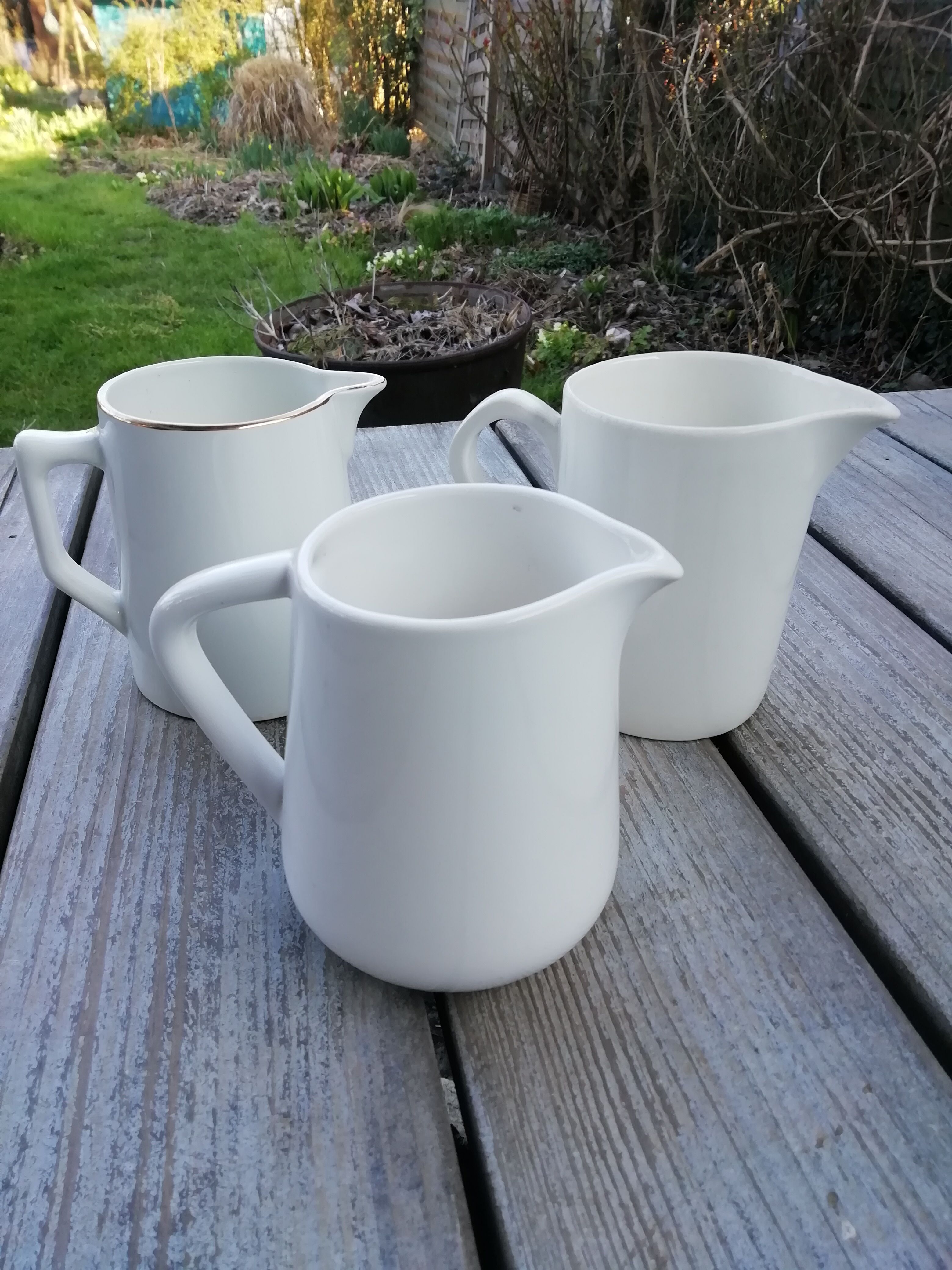 Lot of white porcelain pitchers