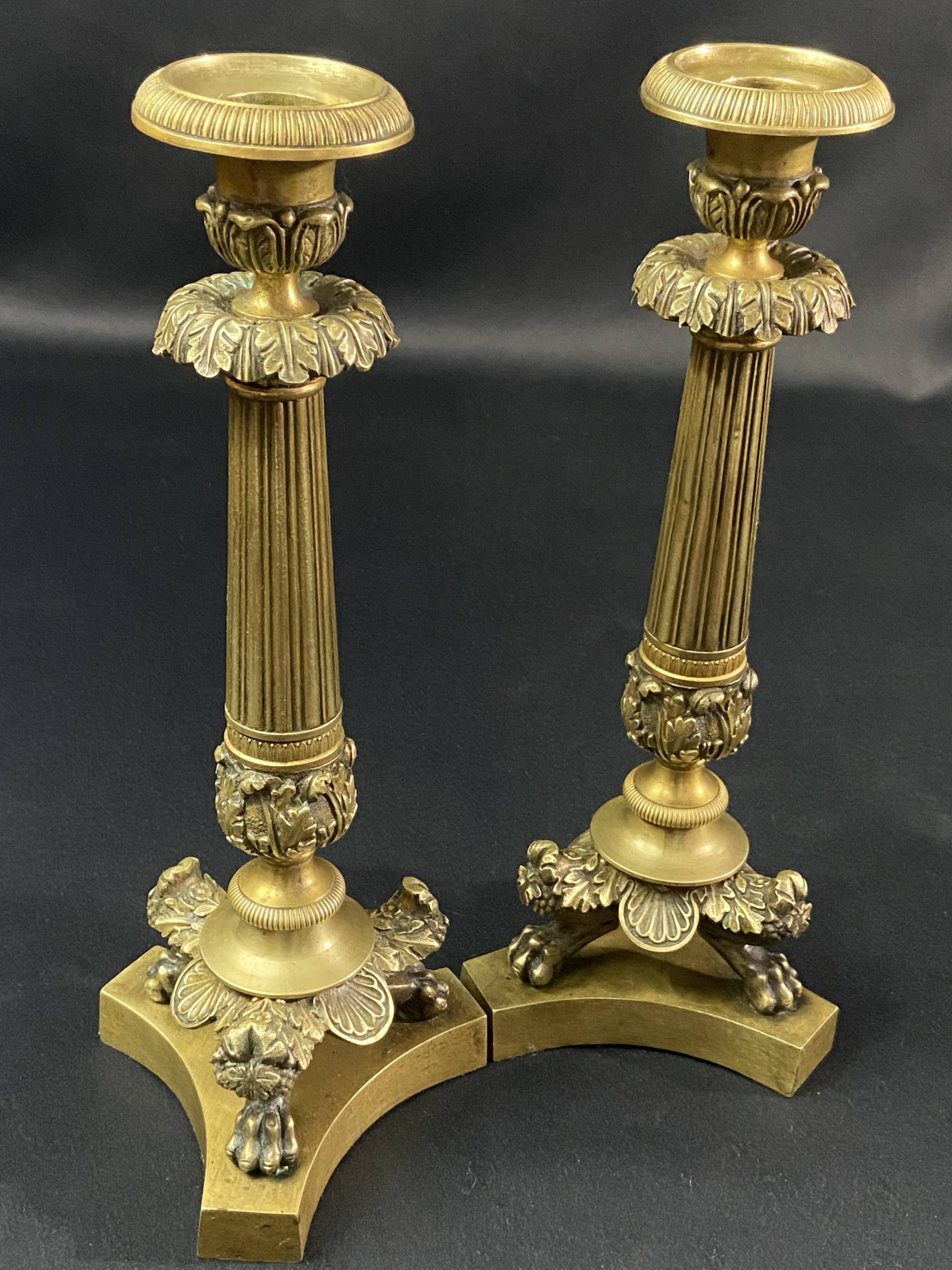 Pair of gilt and chiseled bronze candlesticks from the Restoration period