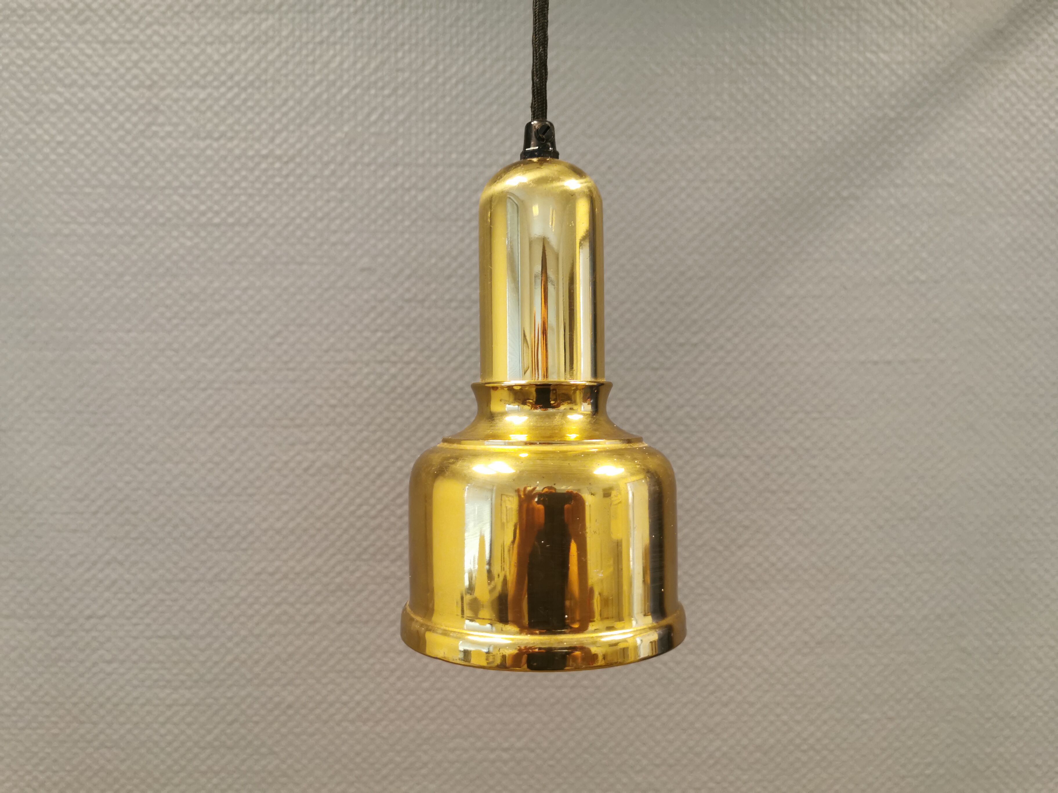 Small golden Danish hanging lamp in metal and brass.