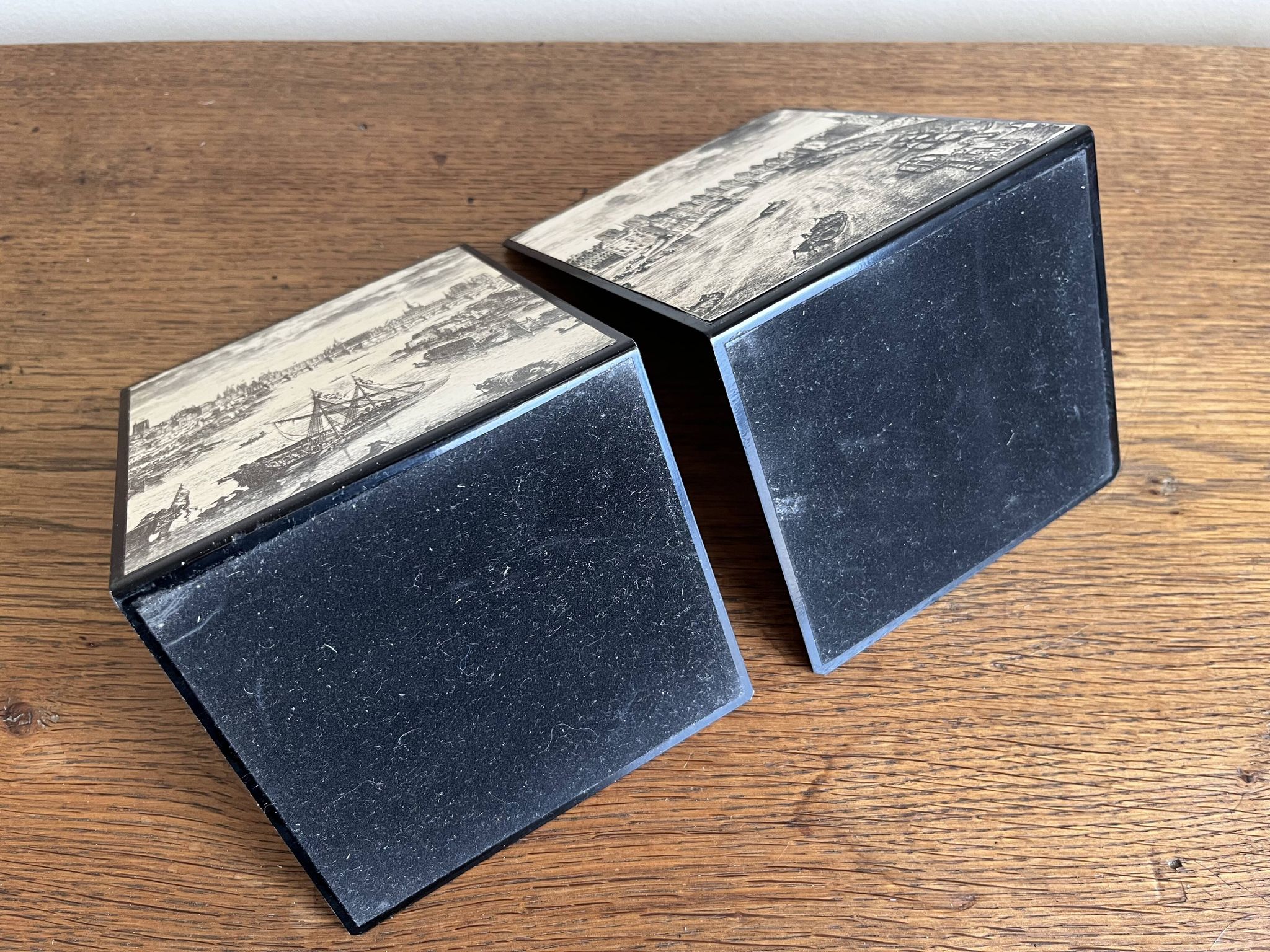 Bookends 1960 between Fornasetti's grey and Toile de Jouy views of Paris.