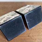 Bookends 1960 between Fornasetti's grey and Toile de Jouy views of Paris.