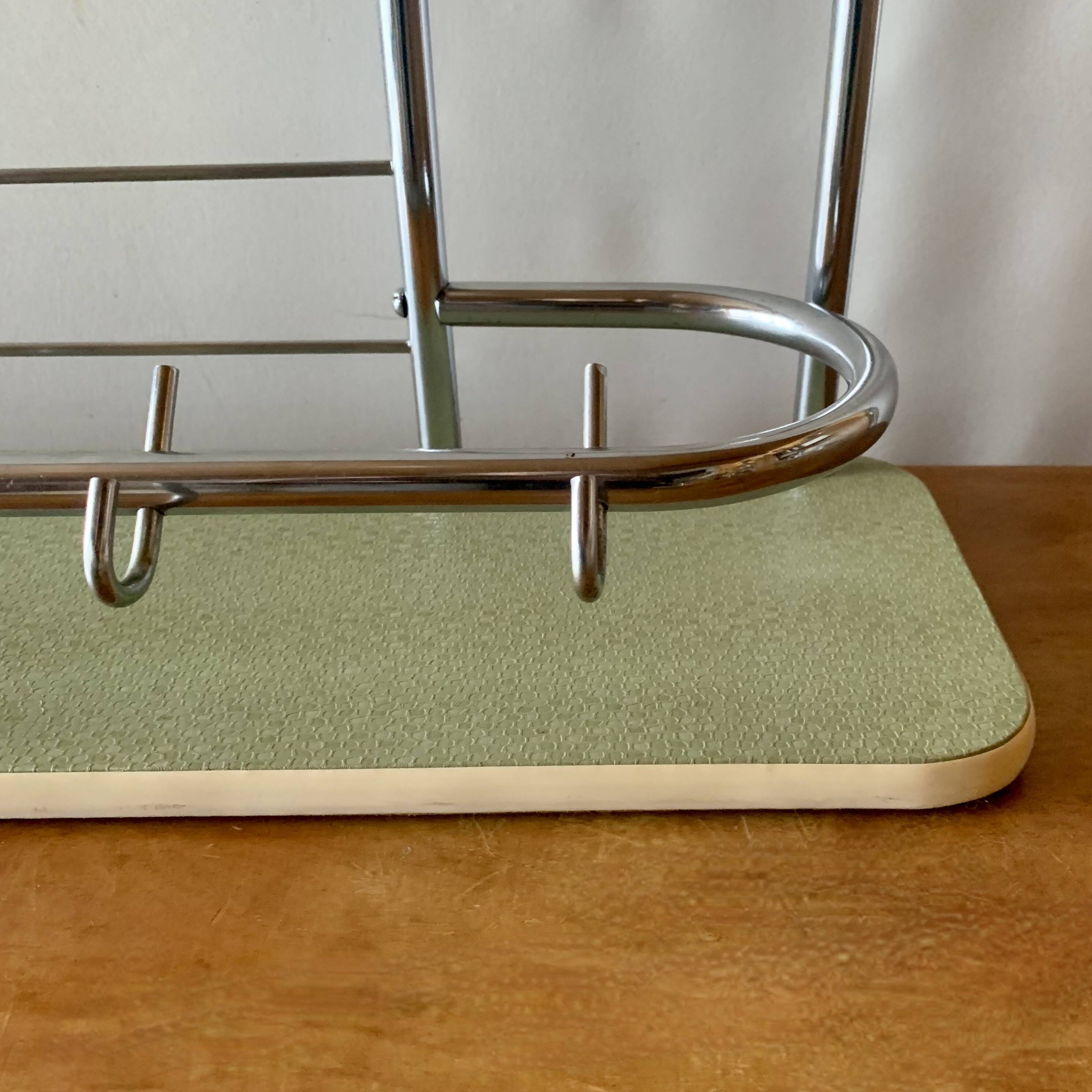 Large vintage wall-mounted coat rack in green Formica and chrome metal