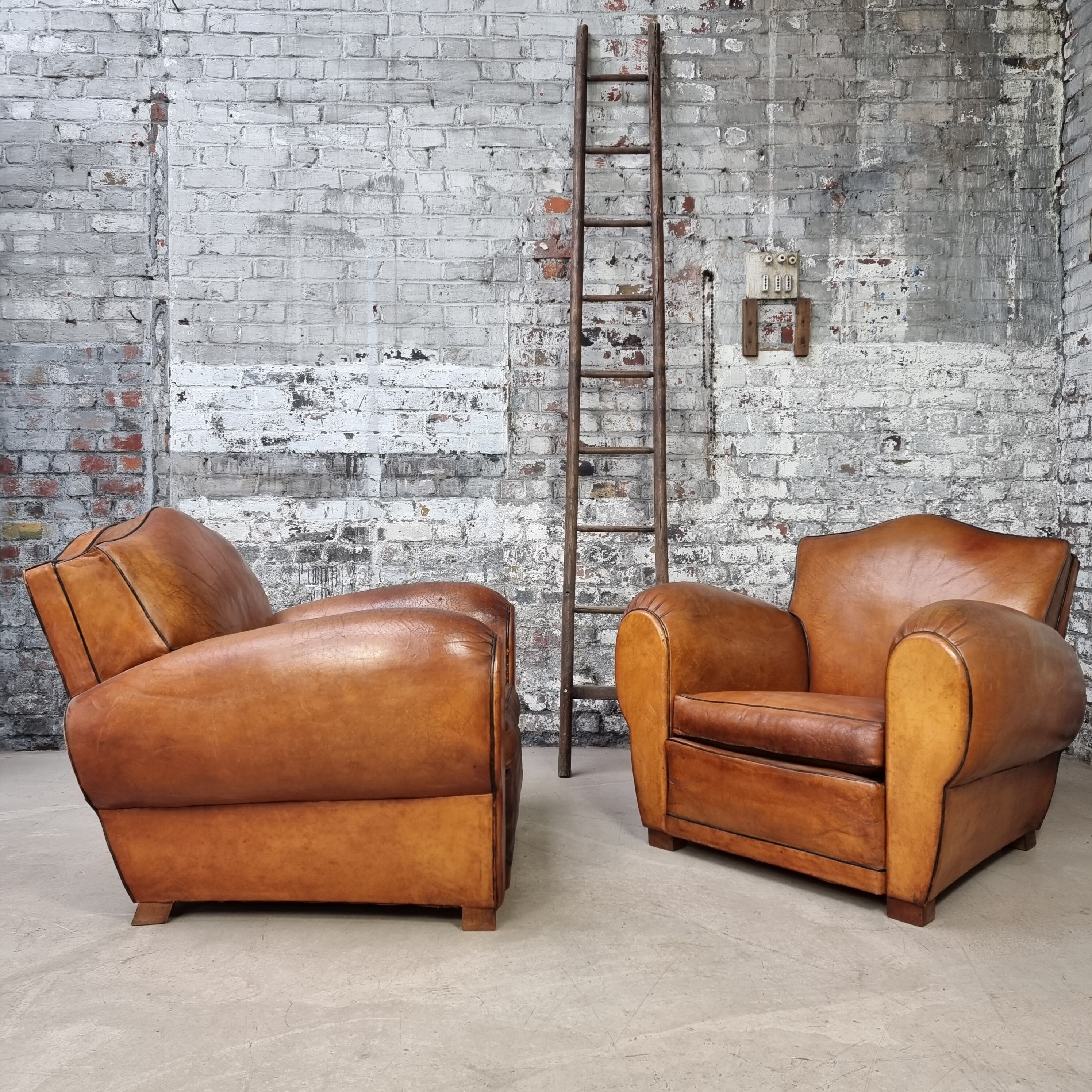 Pair of leather club chairs
